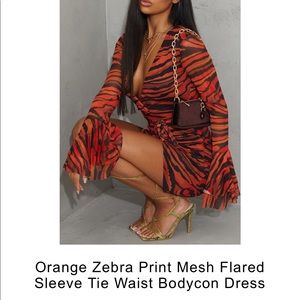 Orange zebra print mesh flare sleeve tie waist bodycon dress